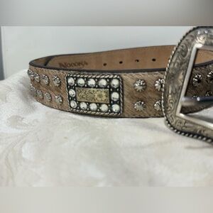 New belt can be unisex Nocona belt has lea like diamonds and little stars